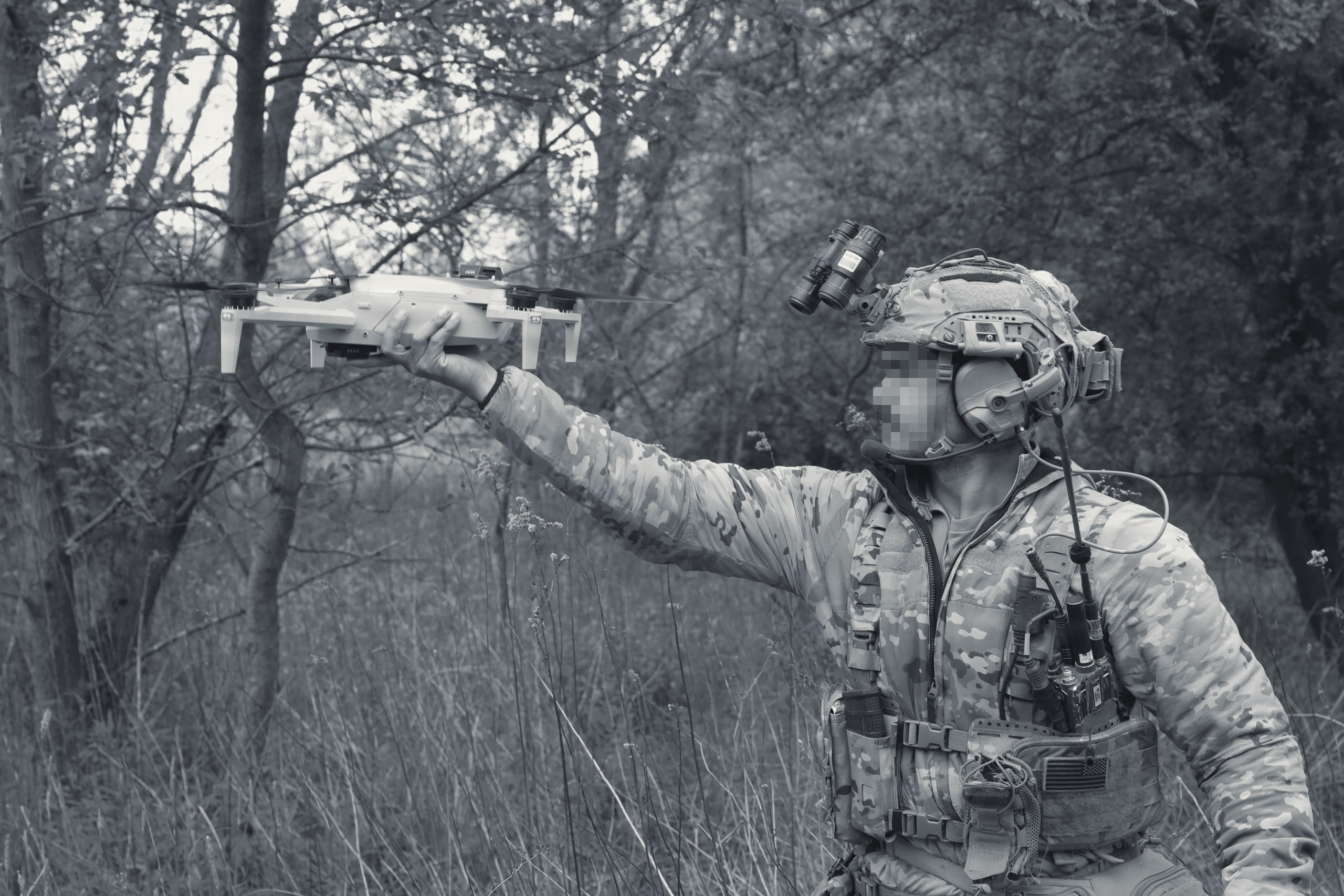 A team operating a drone in the field