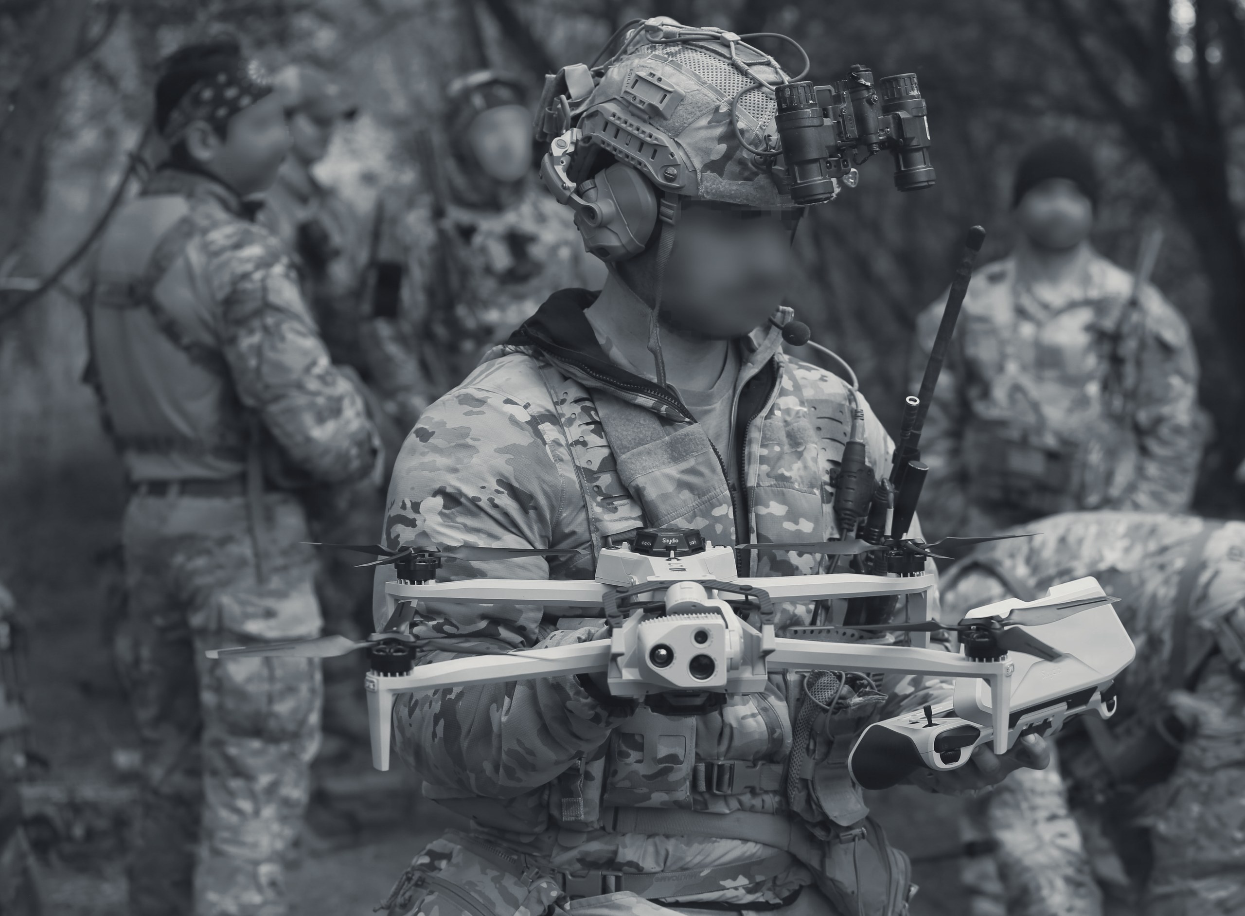 Special Forces operator launching a drone in the field