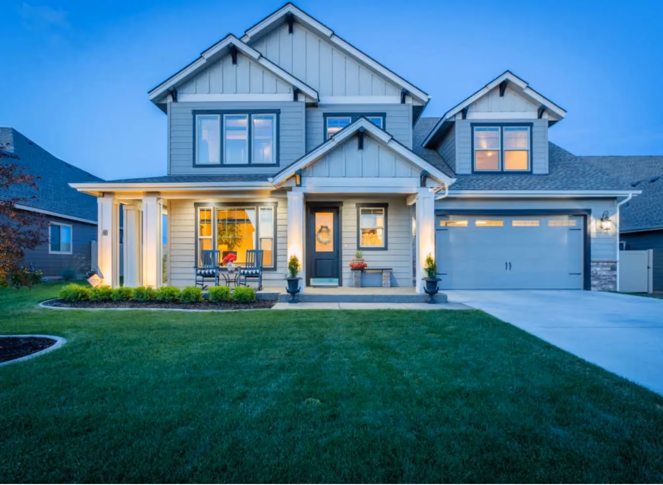 Two-story craftsman home at dusk