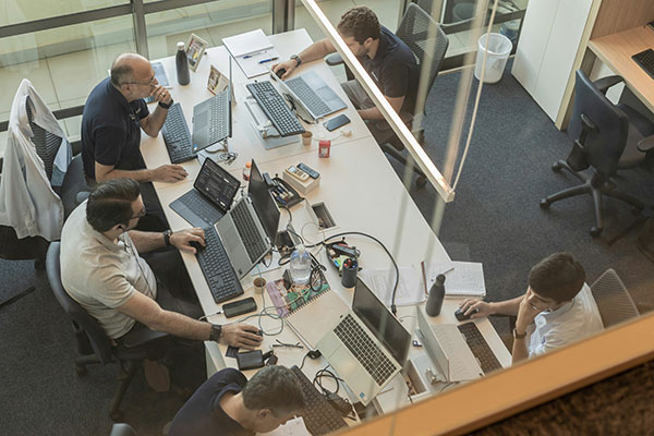 Photo of financial team working, by Beatriz Cattel.