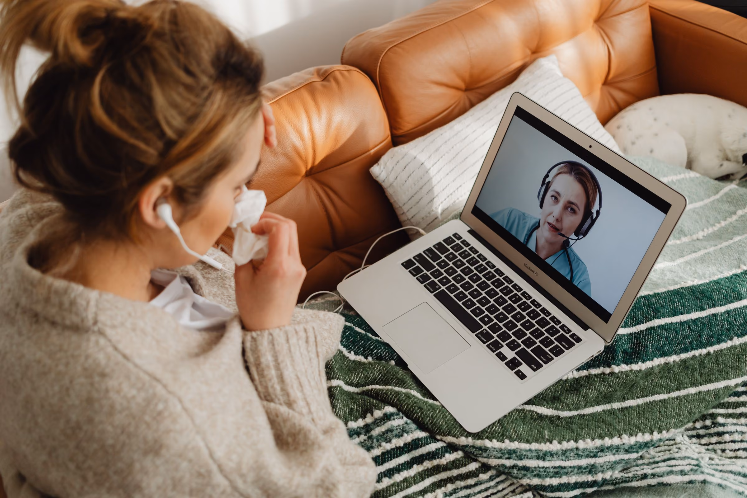 Patient on a video call with an allergist from home