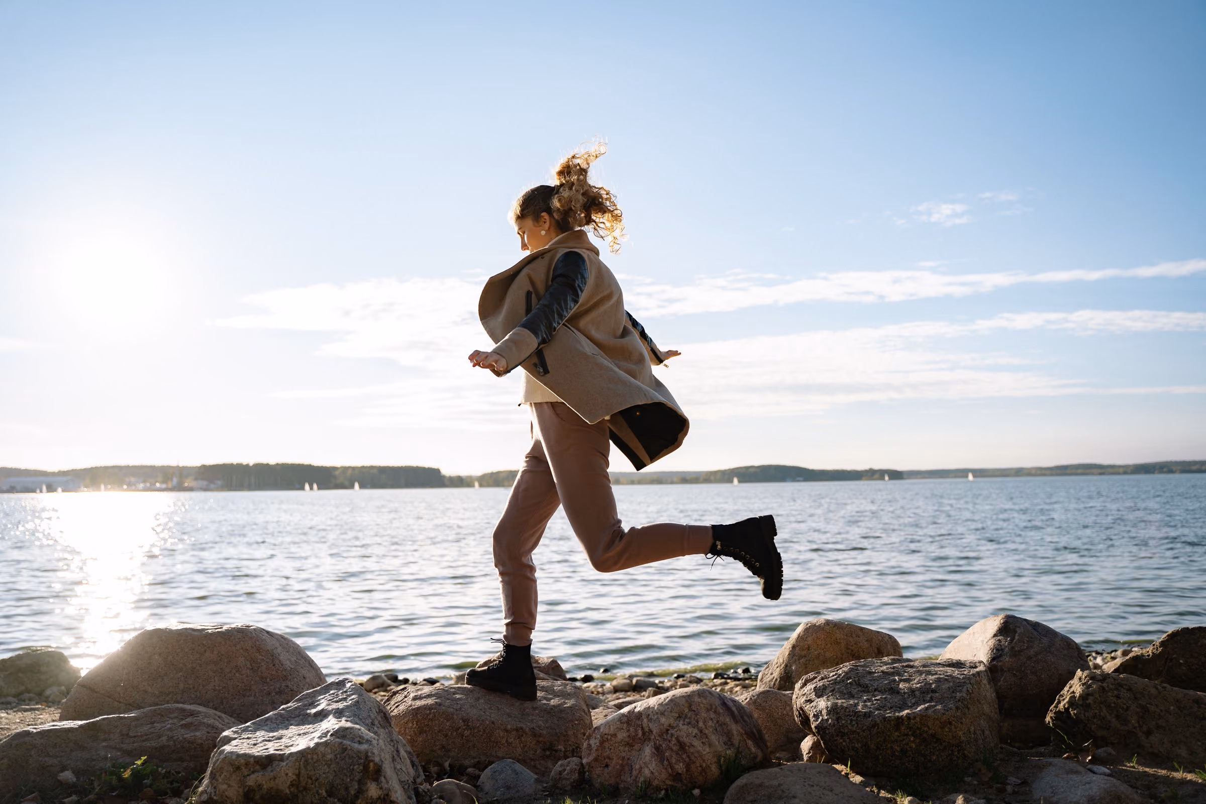 Woman running outdoors, breathing freely