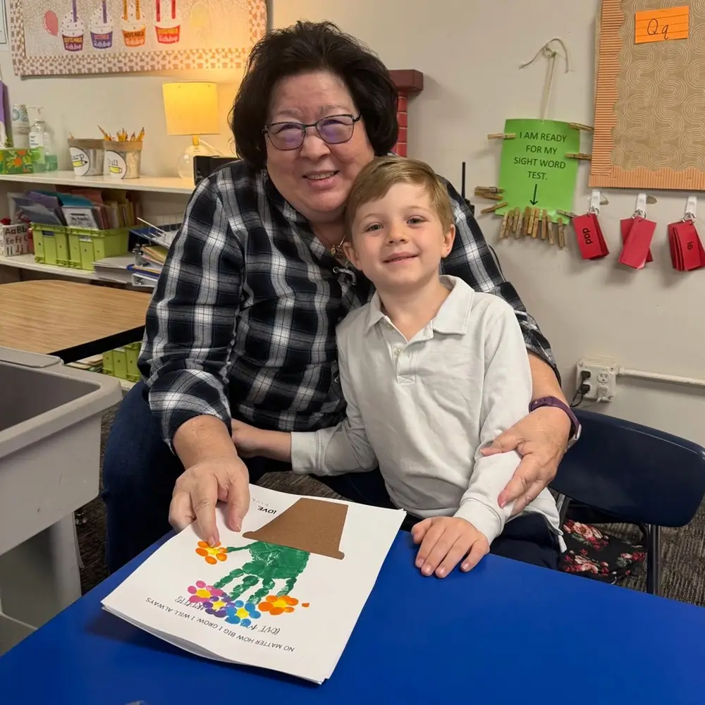 Student and caregiver in an after-school program at St. Joseph Marquette Catholic School in Yakima
