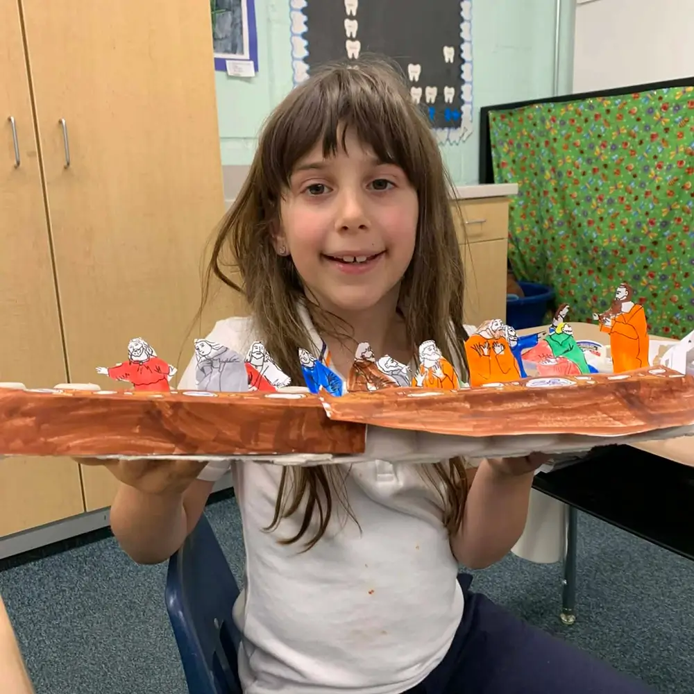 A student working on a craft project at St. Joseph Marquette Catholic School in Yakima