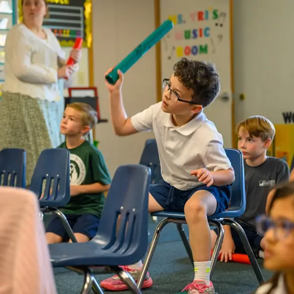 A student playing a recorder in music class at St. Joseph Marquette Catholic School in Yakima