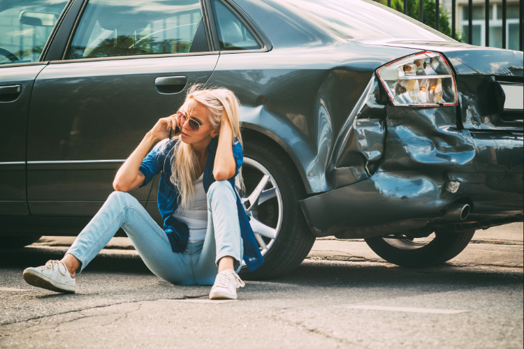 Damaged car left behind after a hit-and-run accident