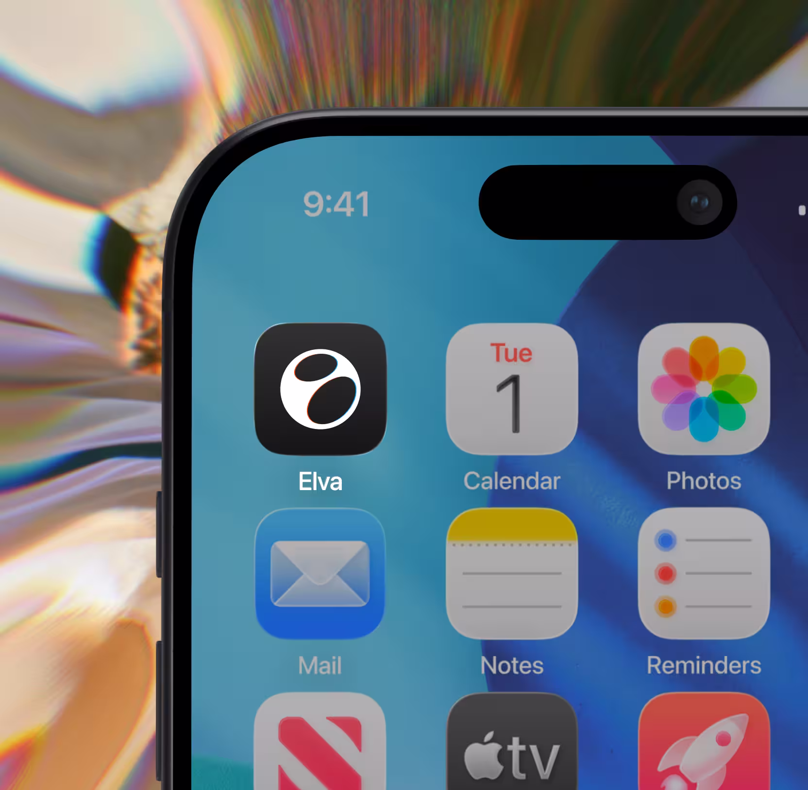 Close-up of an iPhone screen showing app icons including Elva, Calendar, Photos, Mail, Notes, and Reminders.