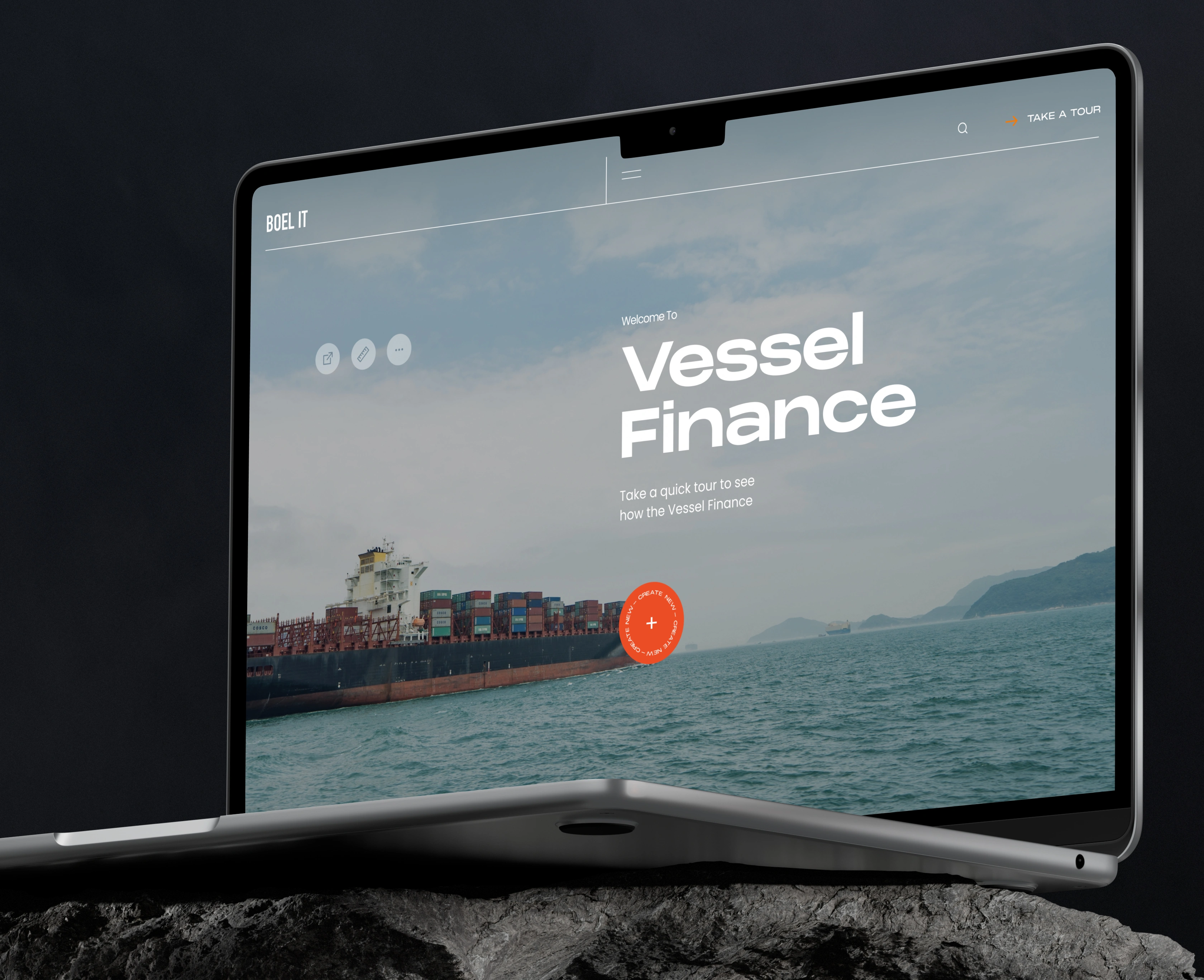 Open laptop showing a website about Vessel Finance with a cargo ship on the sea in the background.