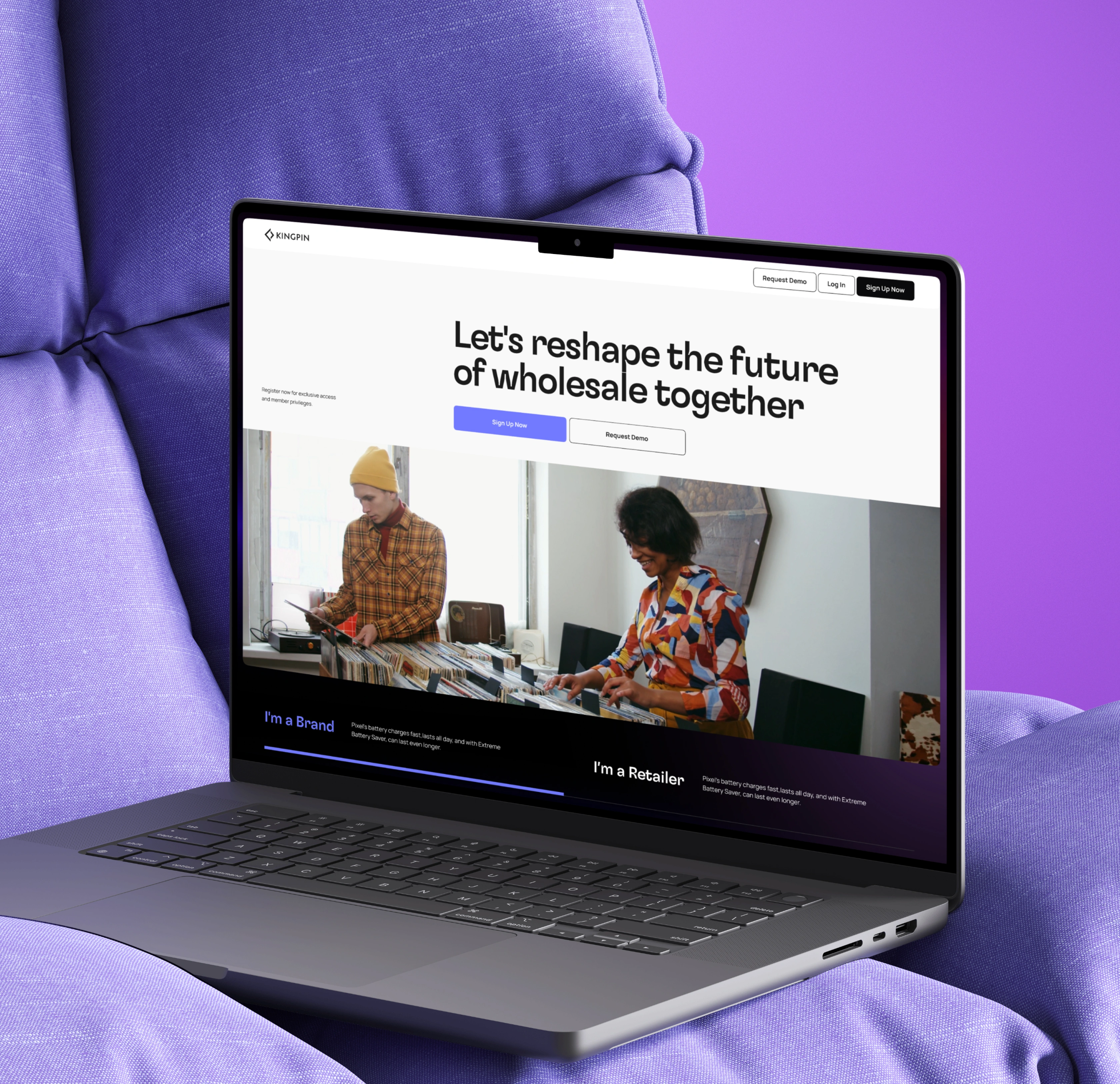 Laptop on purple cushion showing wholesale website with two people browsing records and signup buttons.