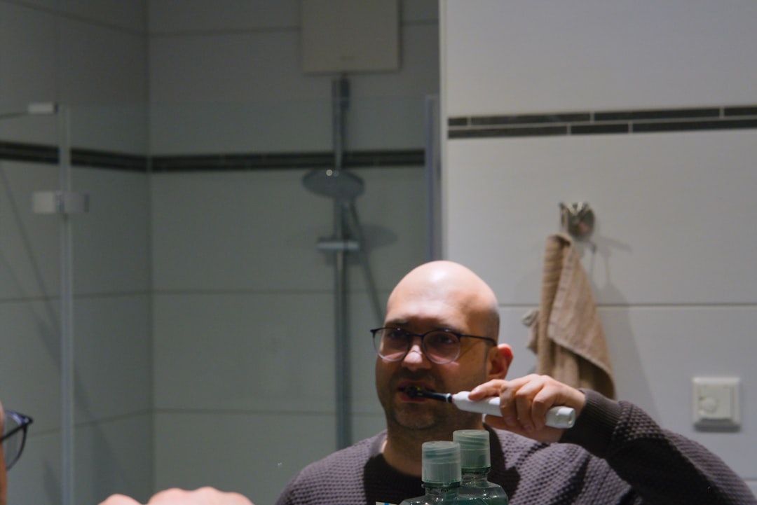 person brushing teeth