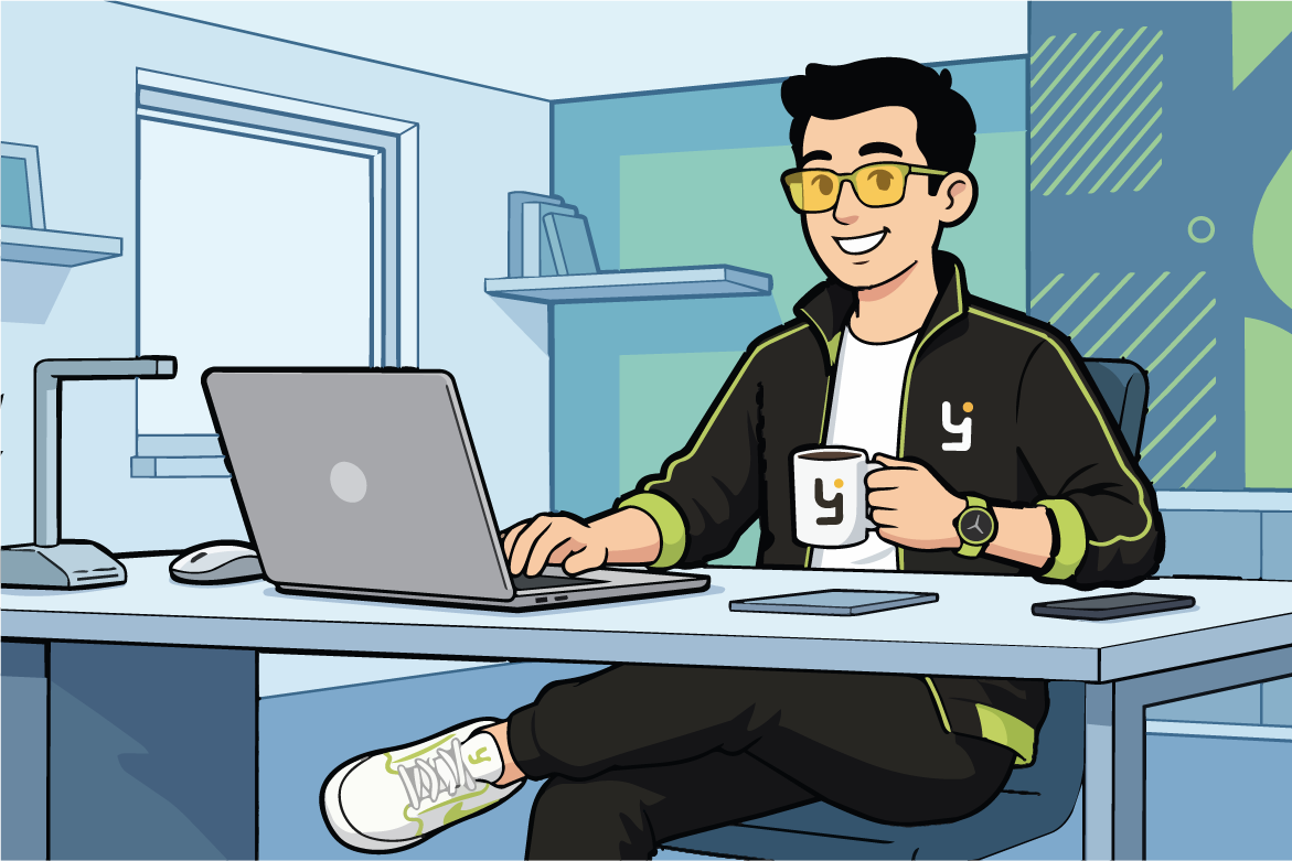 Hombre con gafas amarillas trabajando en laptop y sosteniendo taza en oficina moderna.
