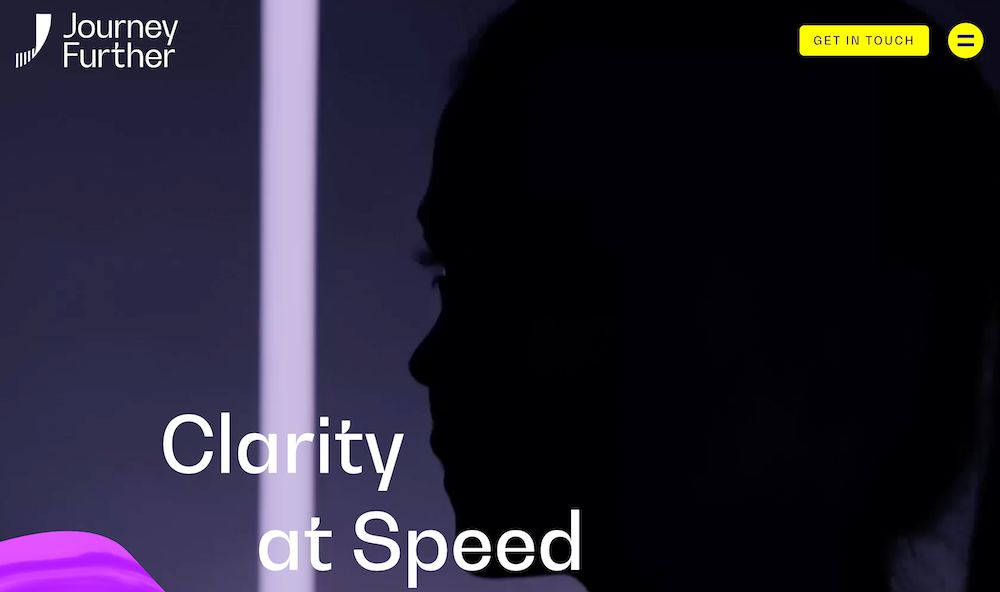 Journey Further's homepage: a dark profile silhouette behind the headline "Clarity at Speed"