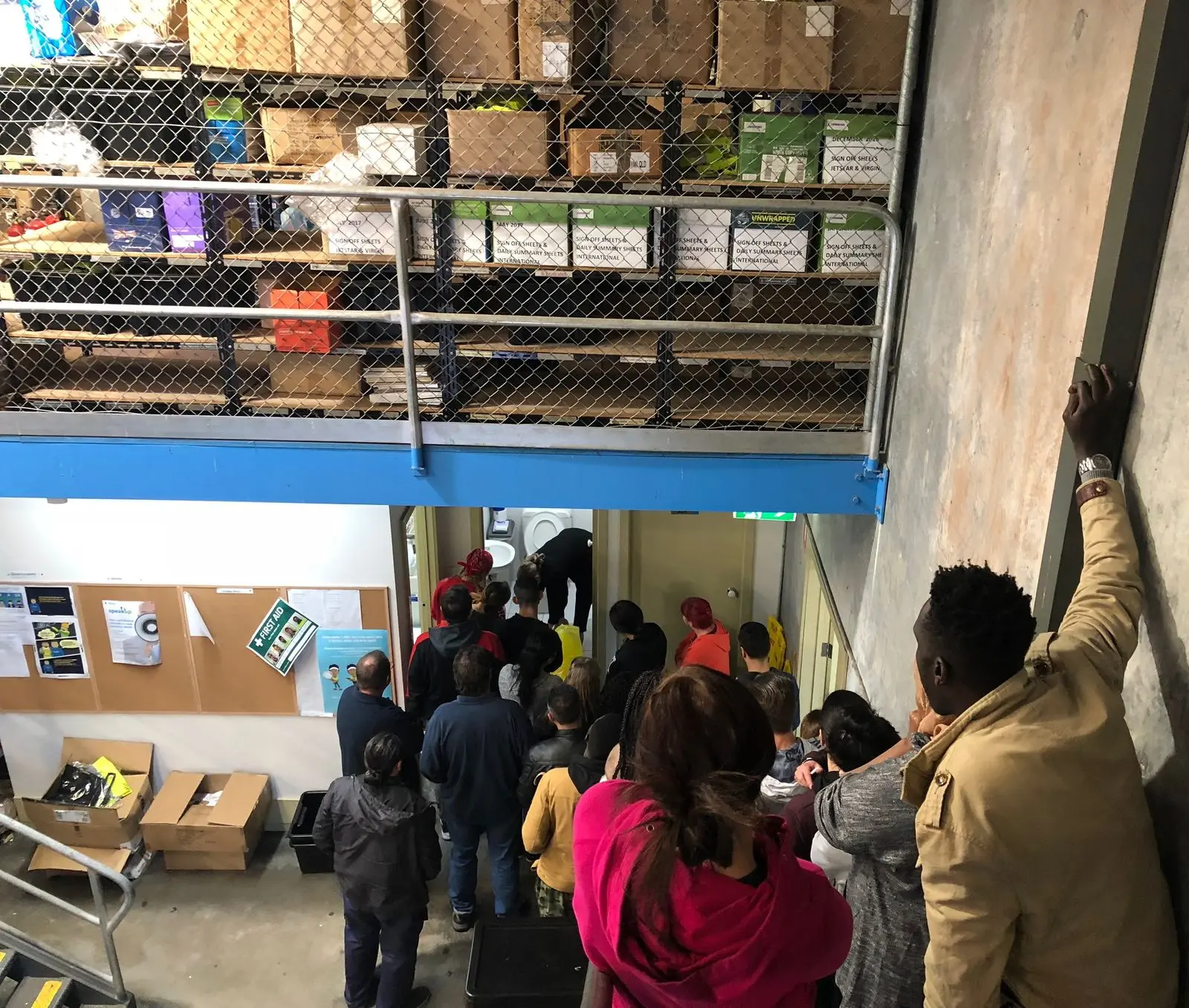 Workers operating in a warehouse environment