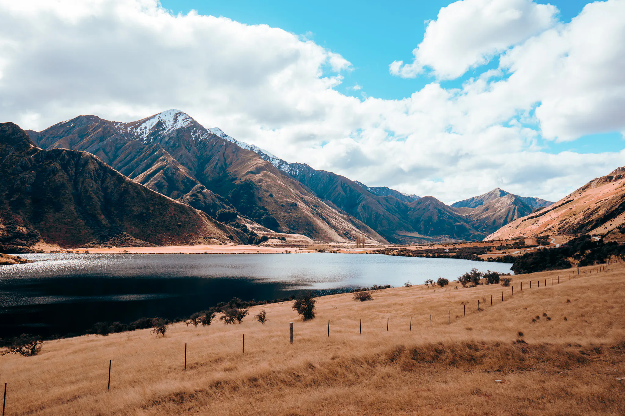 Wide view across Moke Lake and its dry mountain basin