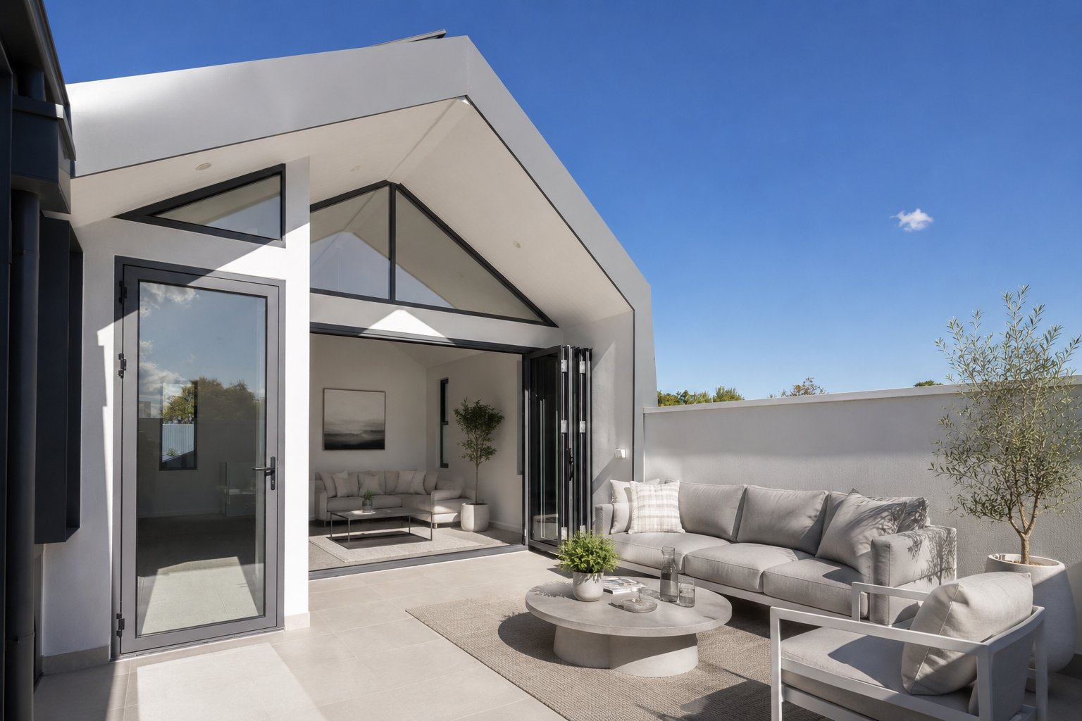 Upstairs balcony with outdoor lounge opening to the living room at 54 North Adelaide.