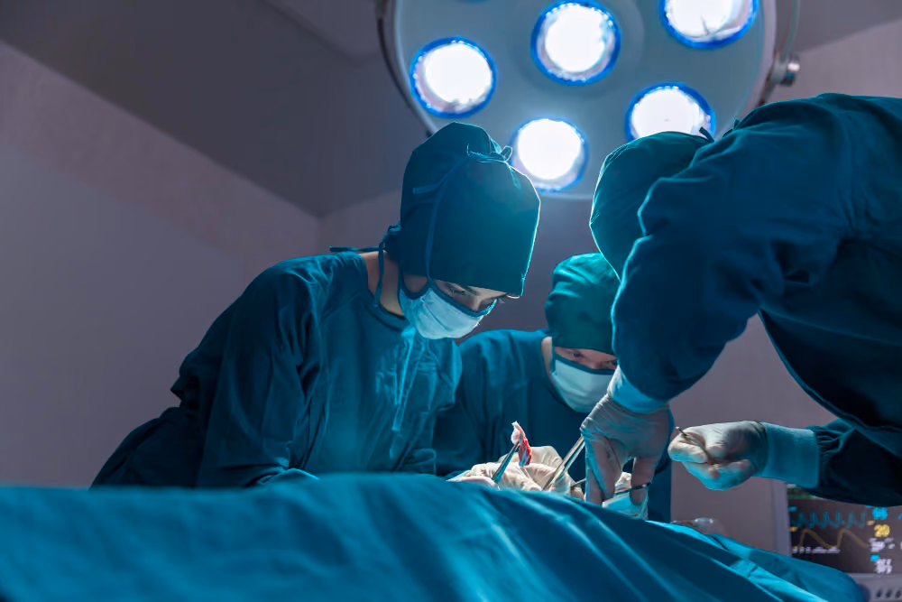Surgical team during an operation under the operating light