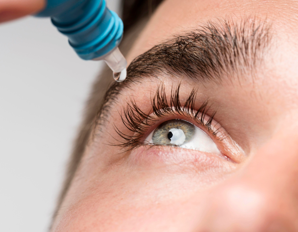 Eye drops being applied to an eye