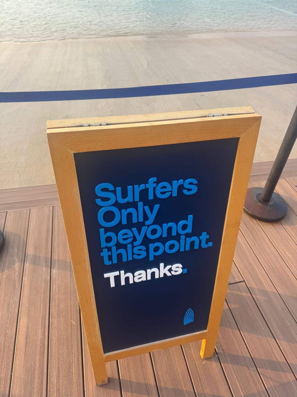 Surfers Only sign on the Hudayriyat Island boardwalk