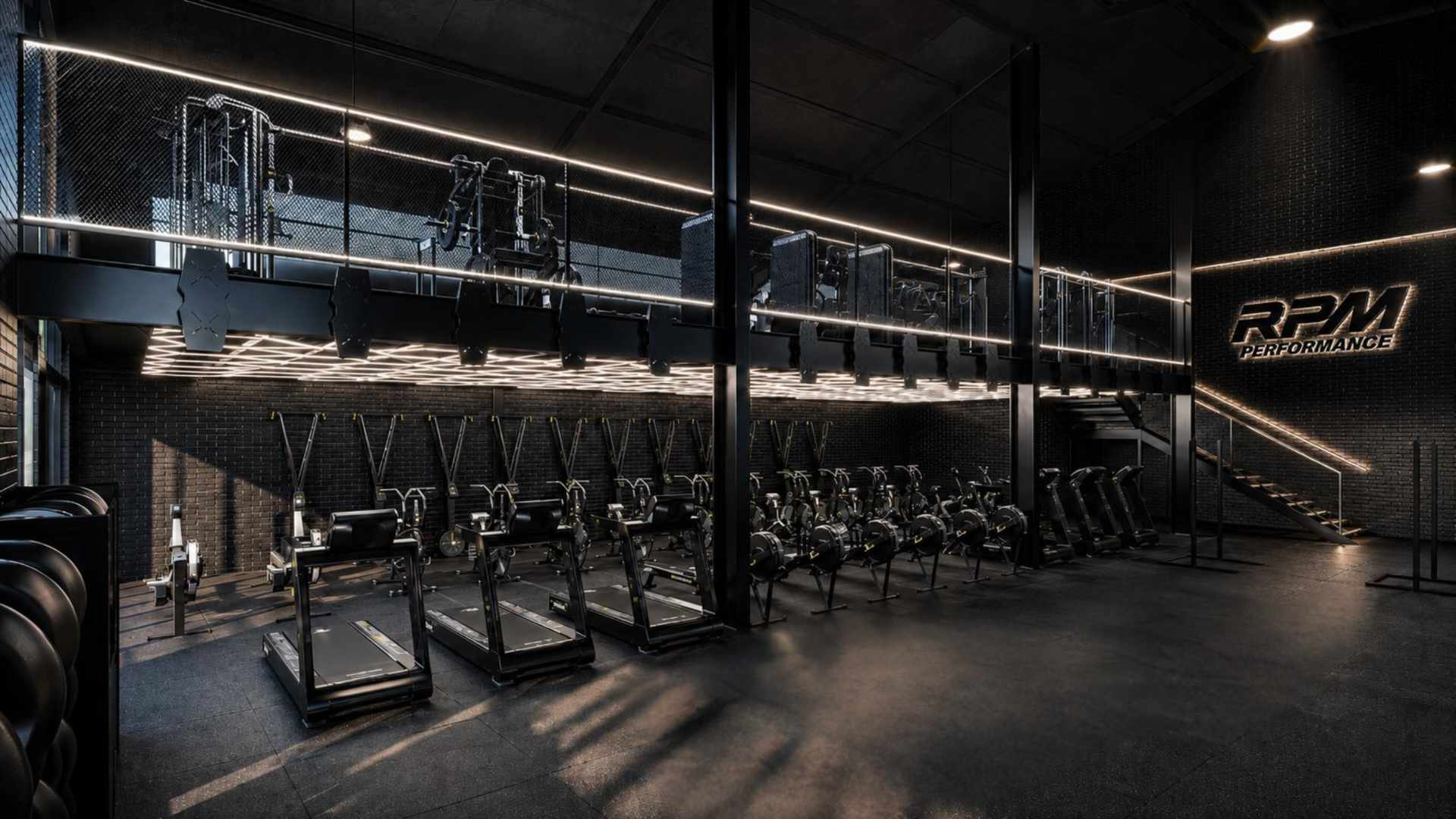 Modern gym interior with treadmills, rowing machines, weights, and RPM Performance, Red Bull, Nike logos on floor and wall.