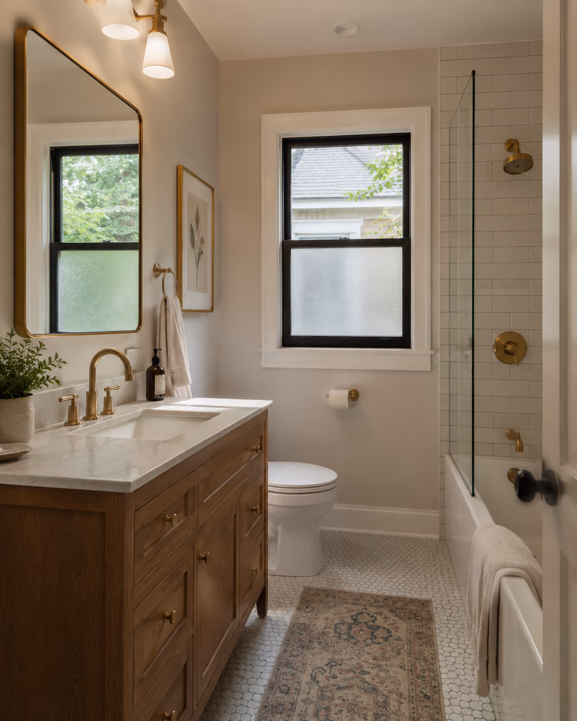 Staged bathroom with vanity and soaking tub