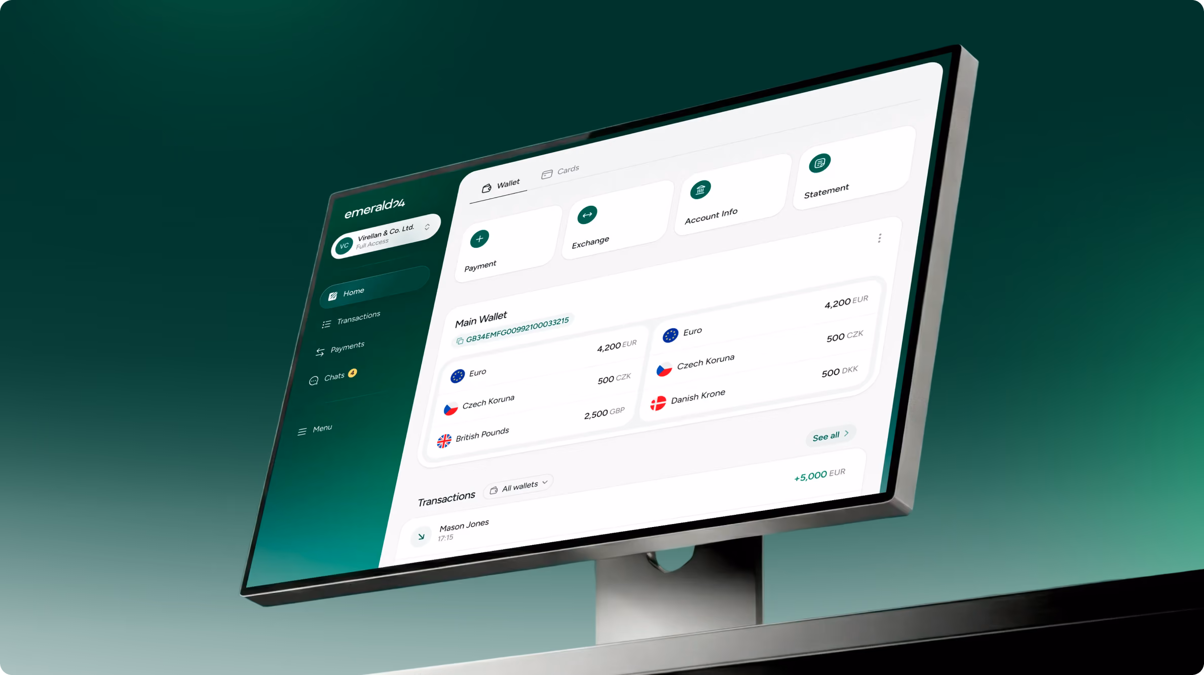 Computer monitor displaying a digital wallet interface named emerald24, showing account info, payment, and exchange options, currency balances, and recent transactions.