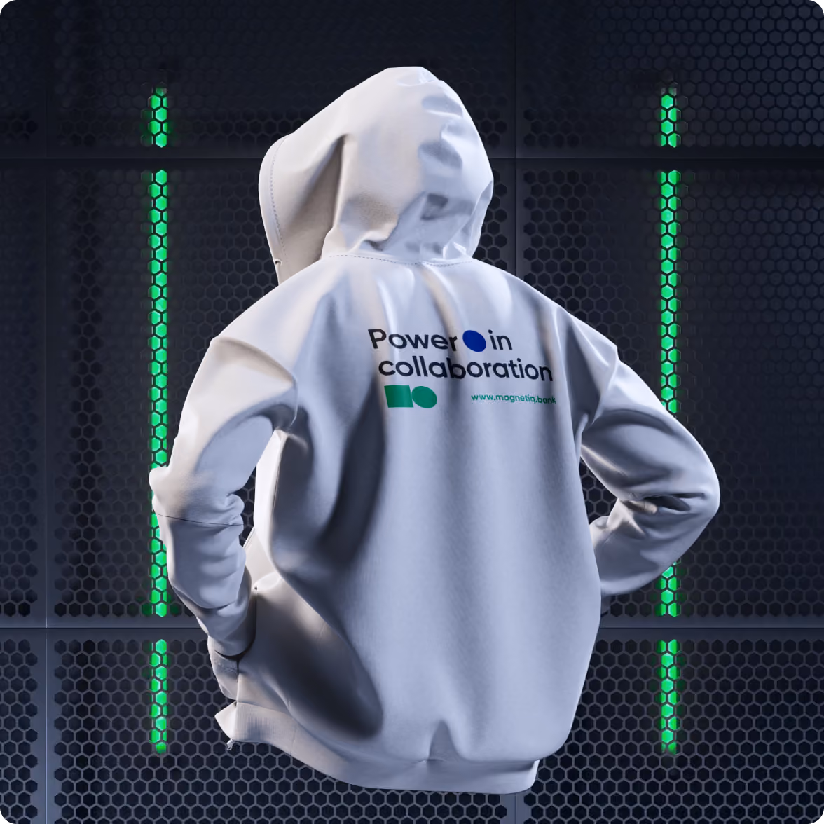Person wearing a white hoodie with the text 'Power in collaboration' and a logo on the back, standing in front of a dark perforated wall with vertical green lights.