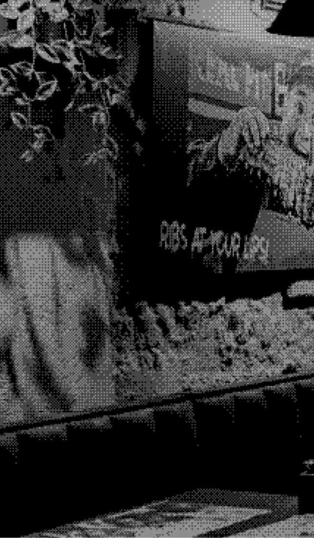 Black and white photo of two people sitting on a couch with text RE.BRO and a flame logo.
