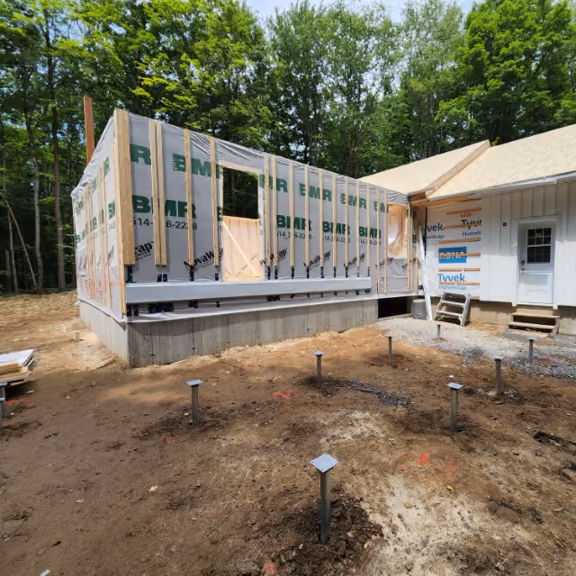 Fondation sur pieux vissés pour patio