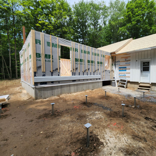 Fondation sur pieux vissés pour patio