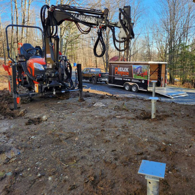 Installation de pieux vissés pour terrasse