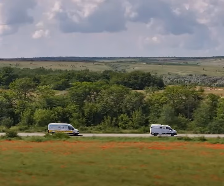 RIDNE delivery vehicles travelling through rural Ukraine
