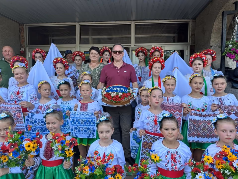 Ukrainian community members in traditional embroidered clothing