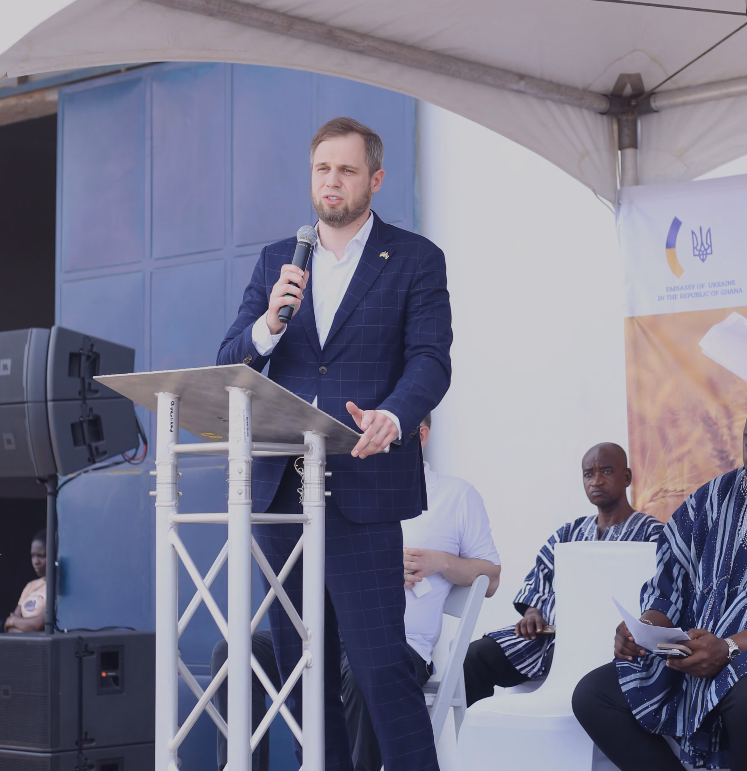 Speaker addressing guests at the RIDNE Food Hub launch in Ghana