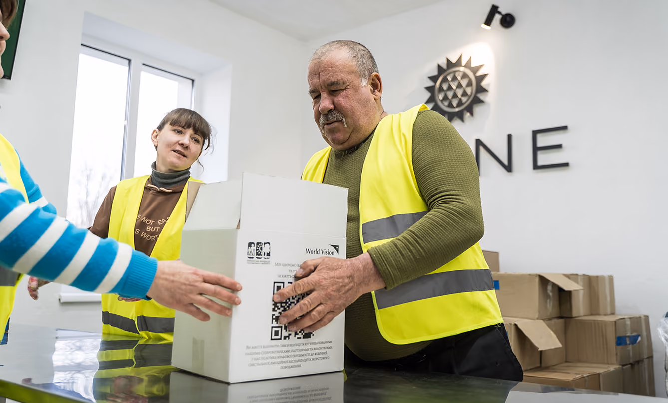 RIDNE team packing humanitarian food kits