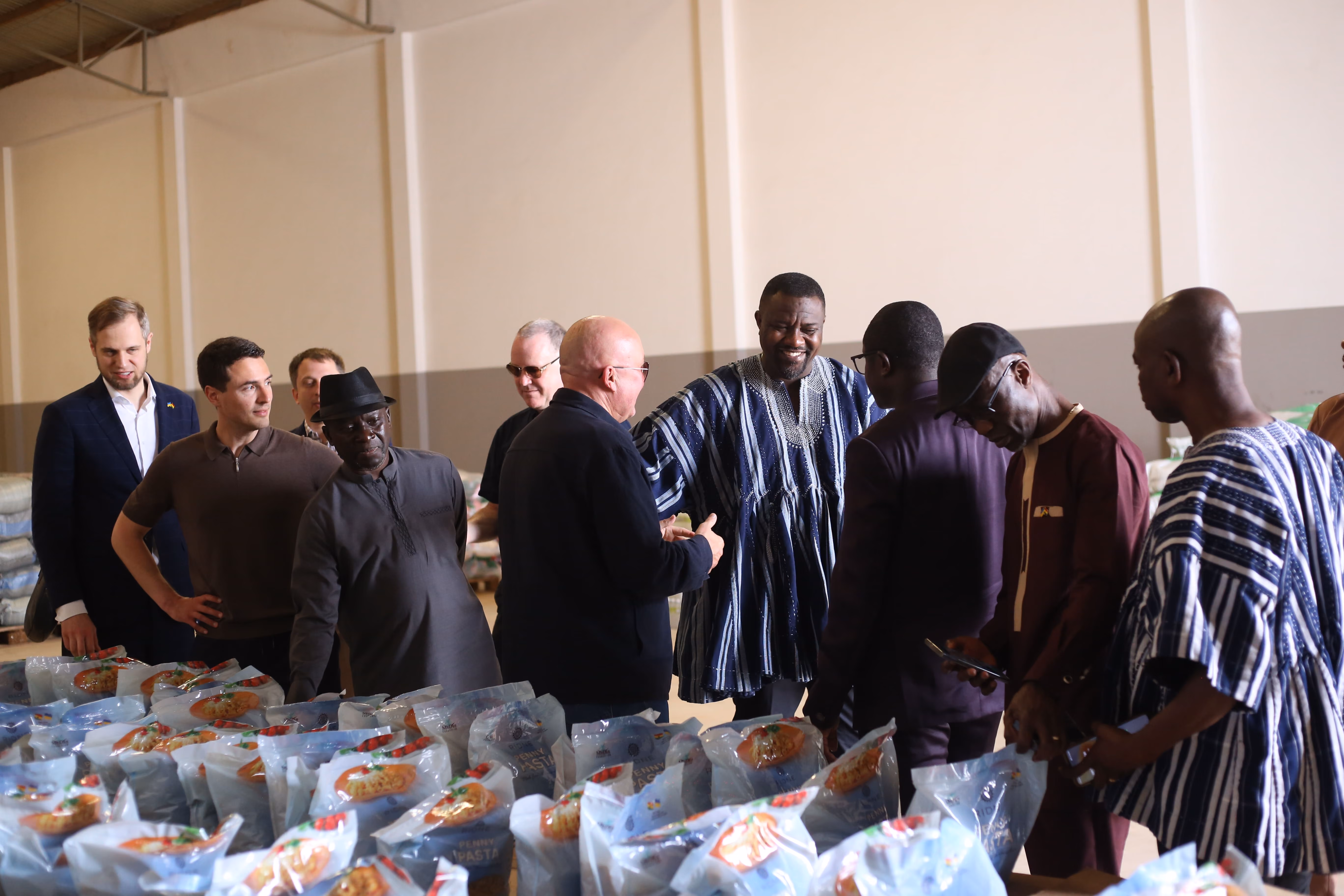 RIDNE and Ghanaian partners reviewing food packages at the Ghana hub