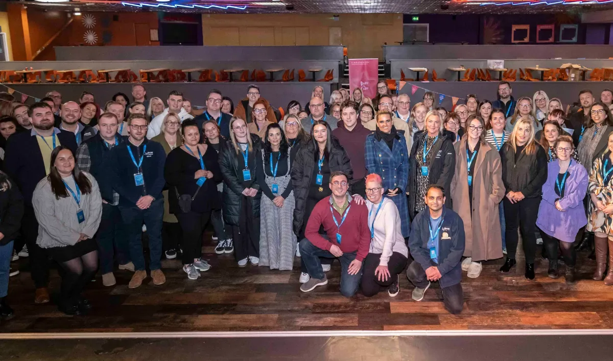 Large group photo at an event, 2025