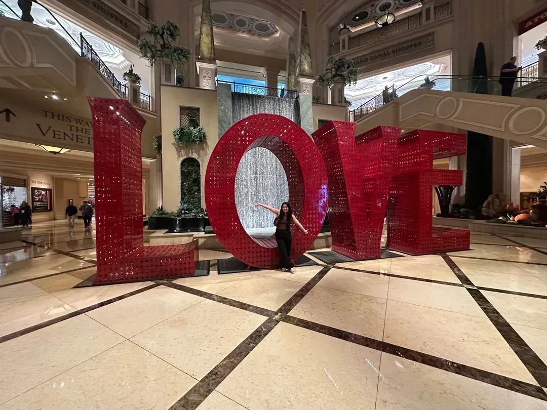 Holly and a big LOVE sign