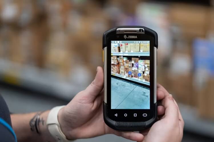 Handheld inventory scanner using augmented reality for inventory management in a Walmart warehouse