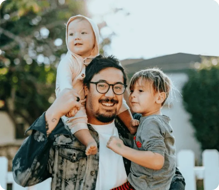 A man and two kids