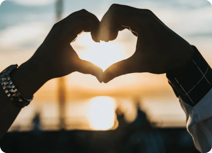 Two hands forming a heart