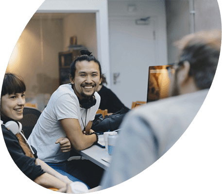 Team of developers collaborating around a table
