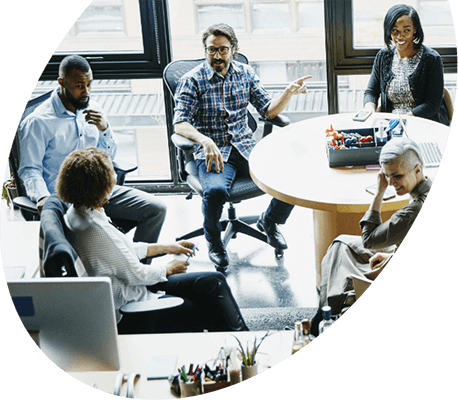 Team meeting around a table in a modern office