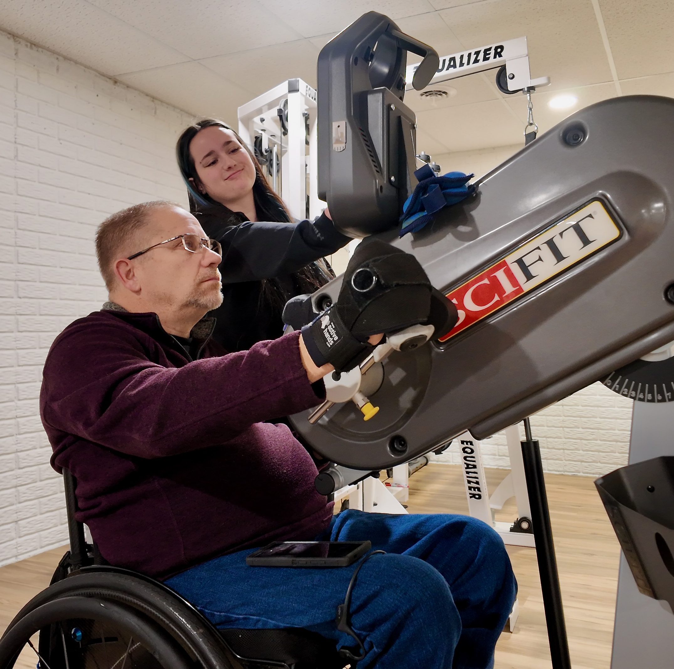 Our founder, Nick training with help from our caregiver Annabell