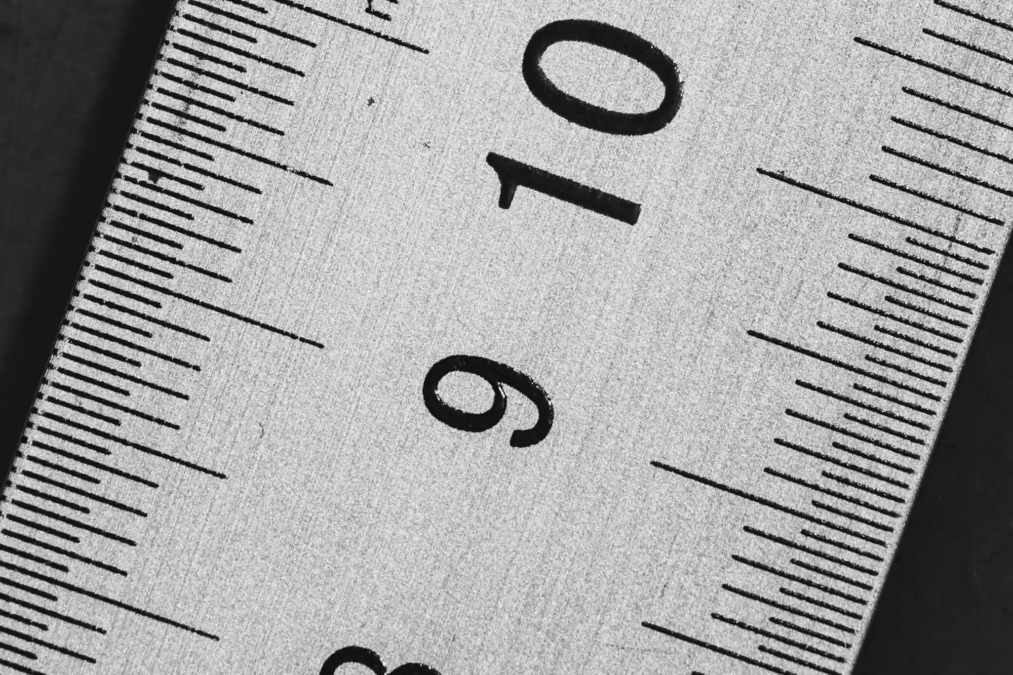 Close-up of a metal ruler, a conceptual image for measuring what really matters