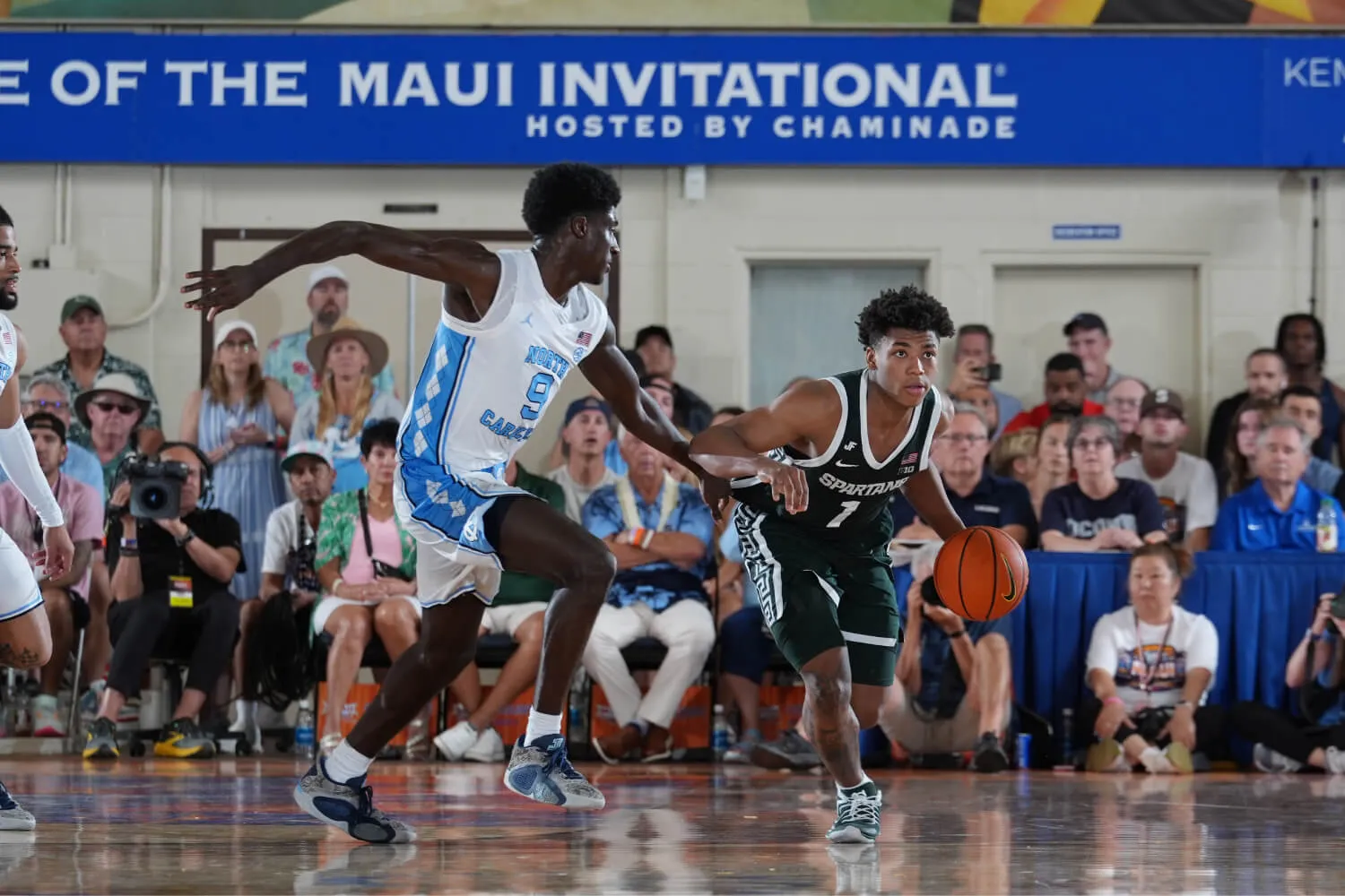basketball players on court at game