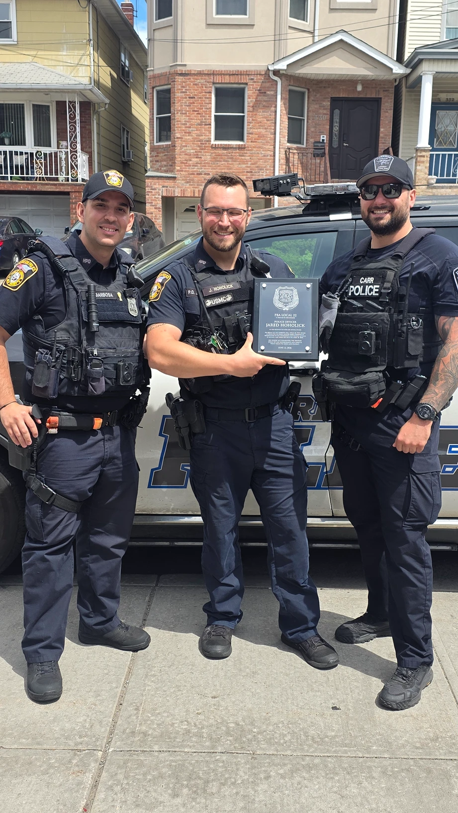 Officer Hoholick receiving the PBA Life Saving Award