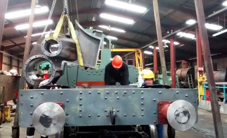Machined steam cylinder casting fitted to the train engine chassis