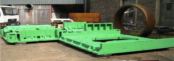 Cast base plate produced using poly pattern tooling