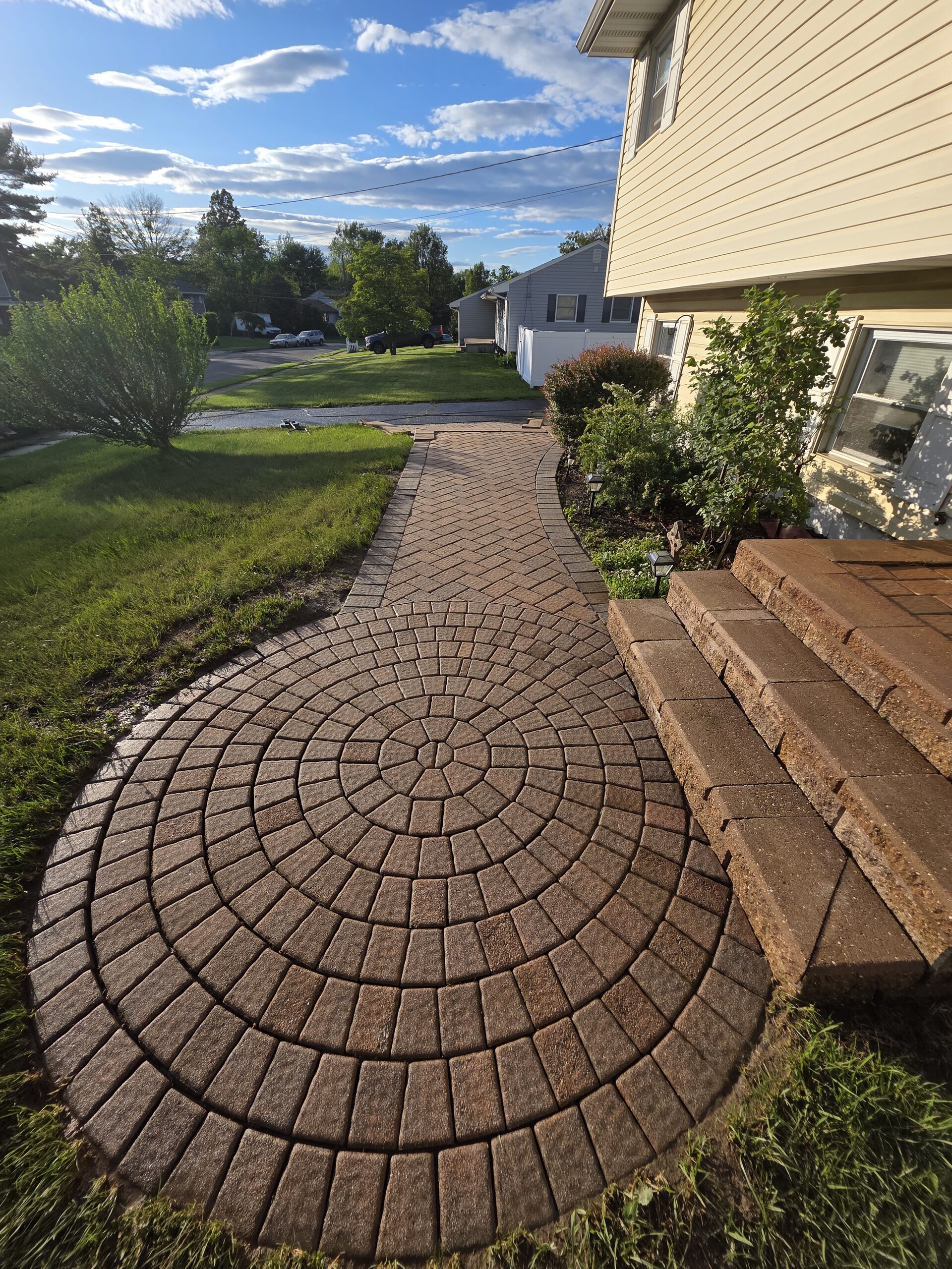 Circular paver walkway installed by M&C in New Jersey