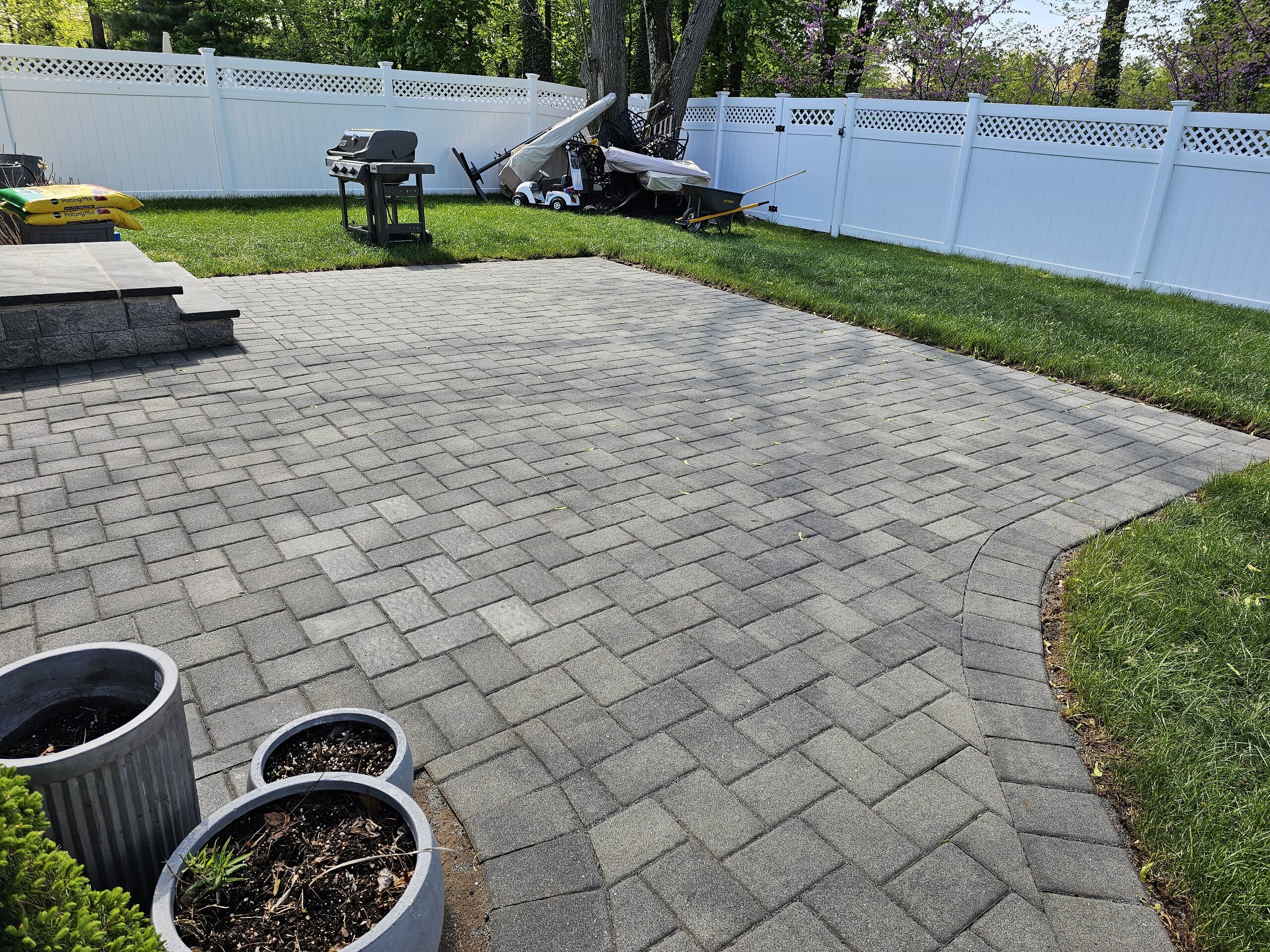Paver patio installation for a New Jersey backyard by M&C Outdoor Services